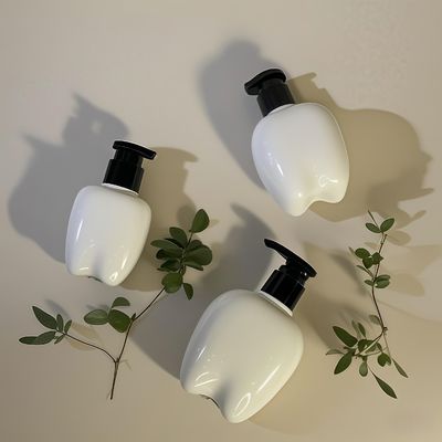 हाथ धोने के लिए प्रेस पंप के साथ 100-250 मिलीलीटर दांत के आकार की प्लास्टिक की बोतल बाल लोशन हाथ सैनिटाइजर अनुकूलन योग्य लोगो