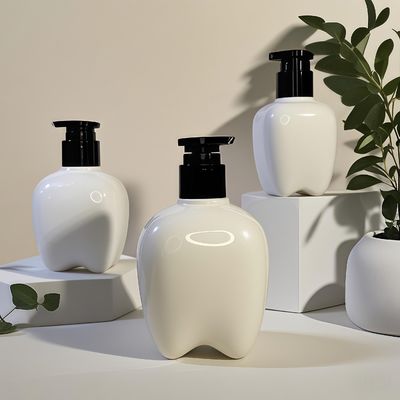 हाथ धोने के लिए प्रेस पंप के साथ 100-250 मिलीलीटर दांत के आकार की प्लास्टिक की बोतल बाल लोशन हाथ सैनिटाइजर अनुकूलन योग्य लोगो